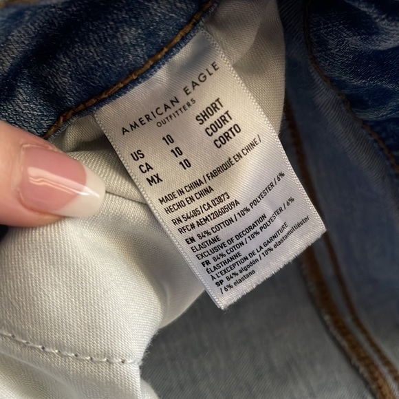 American Eagle Jeggings. Light blue in color with holes down both legs. - Picture 5 of 6